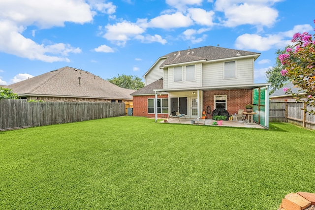 4907 Sienna Heights Ln, Pasadena, TX 77505 - rear view of property with brick siding, a patio area, and a shingled roof