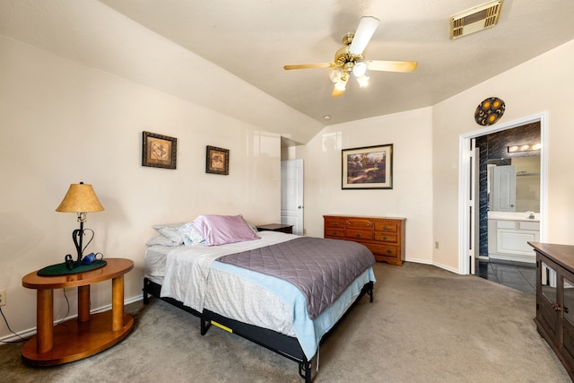 4907 Sienna Heights Ln, Pasadena, TX 77505 - bedroom featuring carpet floors, baseboards, vaulted ceiling, ensuite bathroom, and ceiling fan