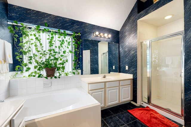 4907 Sienna Heights Ln, Pasadena, TX 77505 - bathroom featuring a bath, vanity, a shower stall, and vaulted ceiling