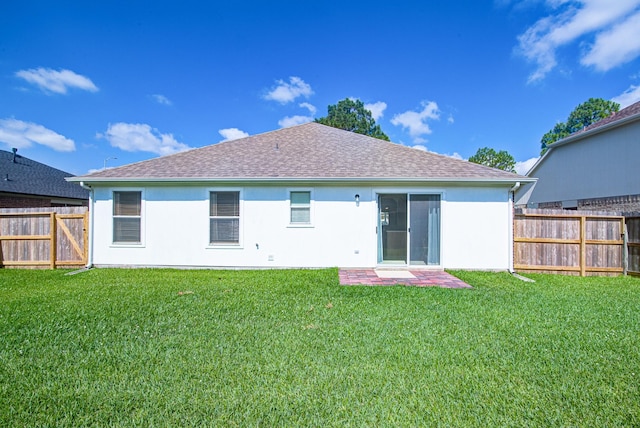 3403 Wheatfield Ct, Pearland, TX 77581 - back of property with a shingled roof and stucco siding