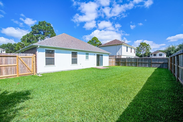 3403 Wheatfield Ct, Pearland, TX 77581 - rear view of house featuring roof with shingles and stucco siding