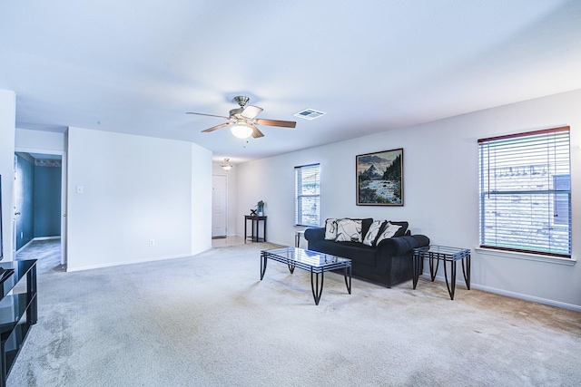 3403 Wheatfield Ct, Pearland, TX 77581 - carpeted living area with a ceiling fan and baseboards