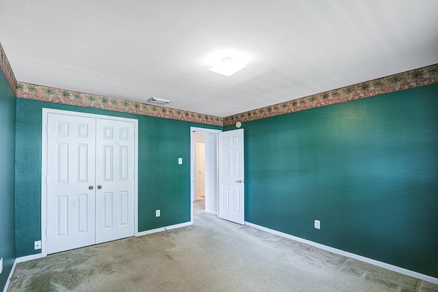 3403 Wheatfield Ct, Pearland, TX 77581 - unfurnished bedroom with a closet, carpet floors, and baseboards