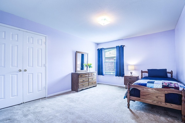 3403 Wheatfield Ct, Pearland, TX 77581 - carpeted bedroom with a closet and baseboards