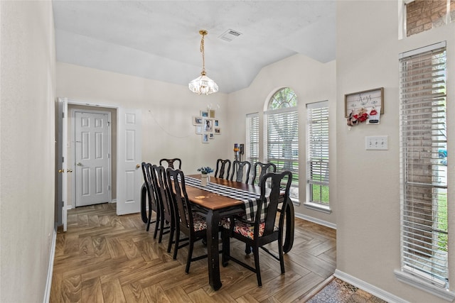 5523 Waverdale Ct, Sugar Land, TX 77479 - dining space featuring lofted ceiling, baseboards, and a chandelier