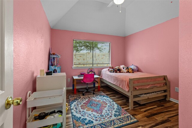 5523 Waverdale Ct, Sugar Land, TX 77479 - bedroom with lofted ceiling, wood finished floors, ceiling fan, baseboards, and a textured wall