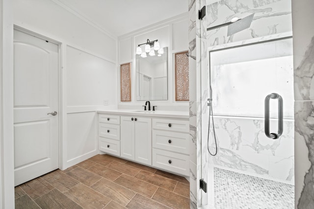 261 Ridge Lake Dr, Montgomery, TX 77316 - full bath with vanity, a marble finish shower, and crown molding