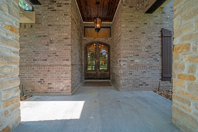 261 Ridge Lake Dr, Montgomery, TX 77316 - doorway to property featuring french doors and brick siding
