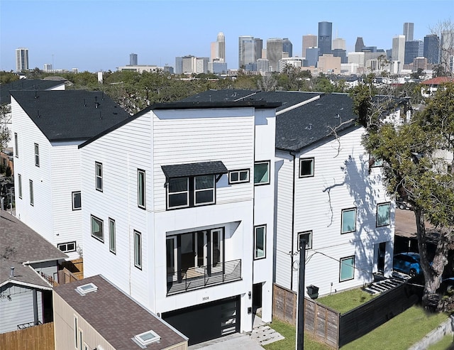 3508 Sauer St, Houston, TX 77004 - view of property featuring a skyline view and an attached garage