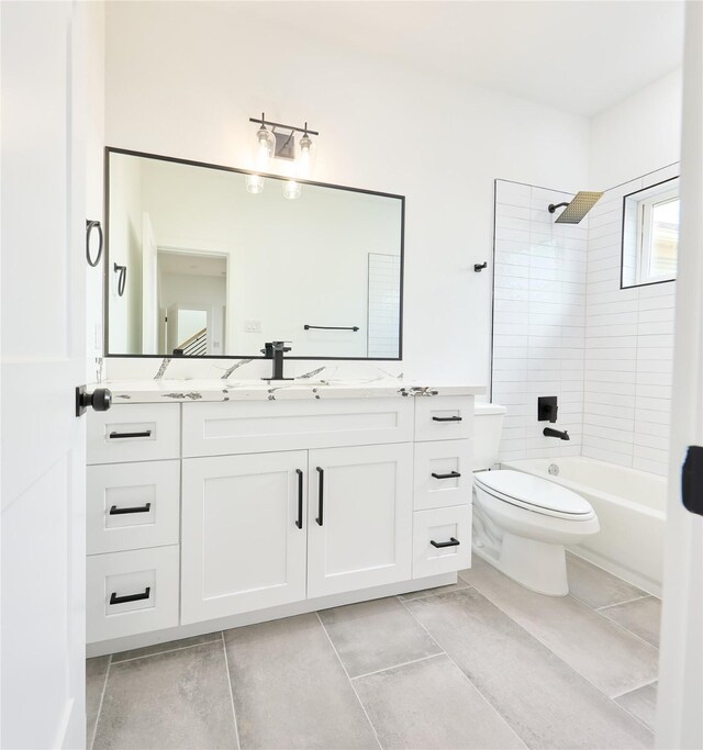 3508 Sauer St, Houston, TX 77004 - full bathroom featuring vanity, toilet,  shower combination, and tile patterned floors