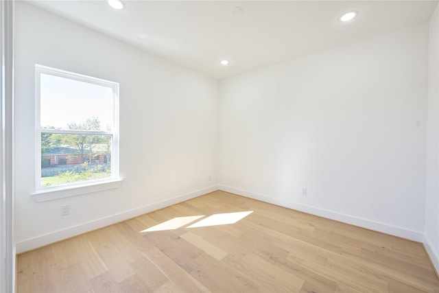 3508 Sauer St, Houston, TX 77004 - unfurnished room with baseboards, light wood-style flooring, and recessed lighting
