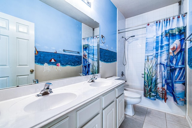 2207 Desert Vine Ct, Sugar Land, TX 77498 - bathroom featuring shower / bath combo with shower curtain, double vanity, toilet, and tile patterned flooring