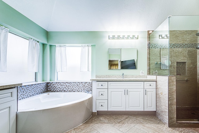 2207 Desert Vine Ct, Sugar Land, TX 77498 - bathroom with a bath, tiled shower, vanity, and marble finish flooring