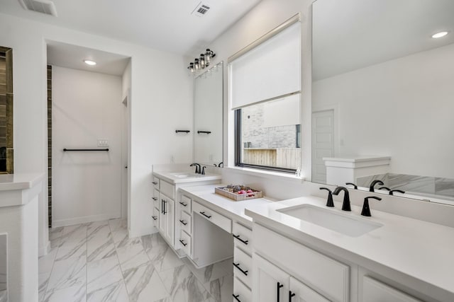 3111 Lantana Trl, Katy, TX 77493 - bathroom with double vanity, recessed lighting, and marble finish floors