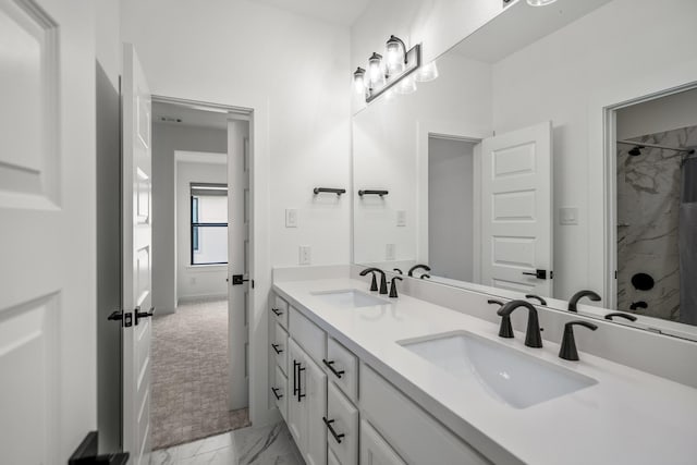 3111 Lantana Trl, Katy, TX 77493 - bathroom featuring marble look tile flooring, double vanity, and a shower