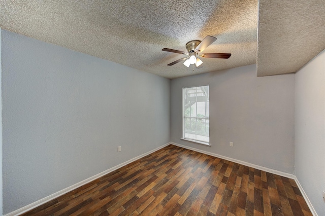 250 El Dorado Blvd Unit 103, Houston, TX 77598 - spare room featuring a ceiling fan, dark wood-type flooring, a textured ceiling, and baseboards