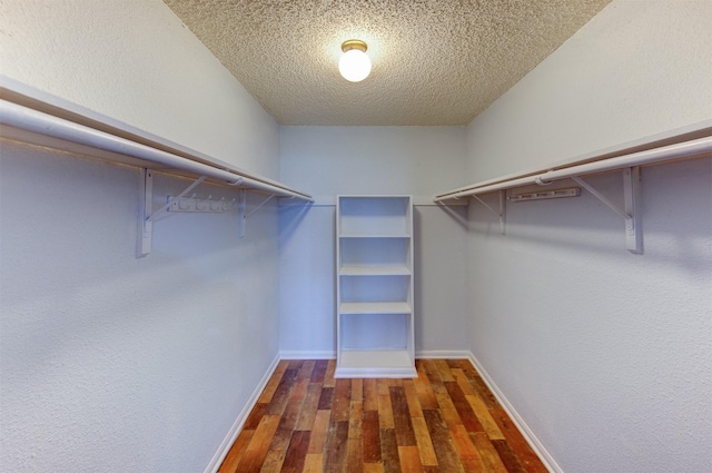 250 El Dorado Blvd Unit 103, Houston, TX 77598 - walk in closet featuring hardwood / wood-style floors