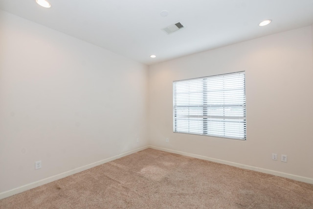 1404 W 26th St Unit C, Houston, TX 77008 - spare room with light colored carpet, recessed lighting, and baseboards
