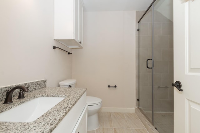 1404 W 26th St Unit C, Houston, TX 77008 - full bathroom with toilet, a stall shower, vanity, baseboards, and tile patterned floors