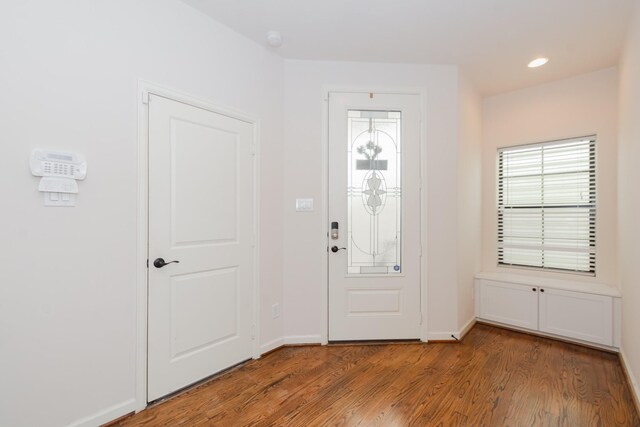 1404 W 26th St Unit C, Houston, TX 77008 - entryway featuring light wood-style flooring, healthy amount of natural light, baseboards, and recessed lighting