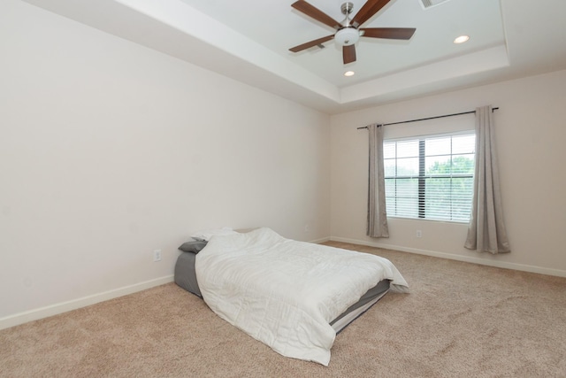 1404 W 26th St Unit C, Houston, TX 77008 - carpeted bedroom with recessed lighting, baseboards, a raised ceiling, and ceiling fan