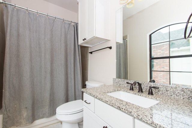 1404 W 26th St Unit C, Houston, TX 77008 - full bath featuring toilet, vanity, and shower / bath combo with shower curtain