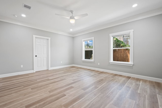 7024 Avenue Ave E, Houston, TX 77011 - unfurnished room with ornamental molding, a ceiling fan, light wood-style flooring, baseboards, and recessed lighting