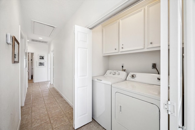 4014 Warchest Ct, Galveston, TX 77554 - laundry room featuring cabinet space, washing machine and clothes dryer, attic access, and baseboards