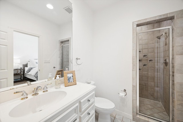 4014 Warchest Ct, Galveston, TX 77554 - ensuite bathroom featuring a stall shower, vanity, toilet, and tile patterned floors