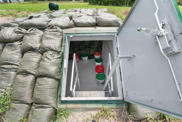 9 Wood Forest Dr, New Waverly, TX 77358 - entry to storm shelter