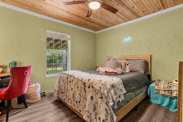 9 Wood Forest Dr, New Waverly, TX 77358 - bedroom with ornamental molding, hardwood / wood-style floors, a textured wall, wooden ceiling, and ceiling fan