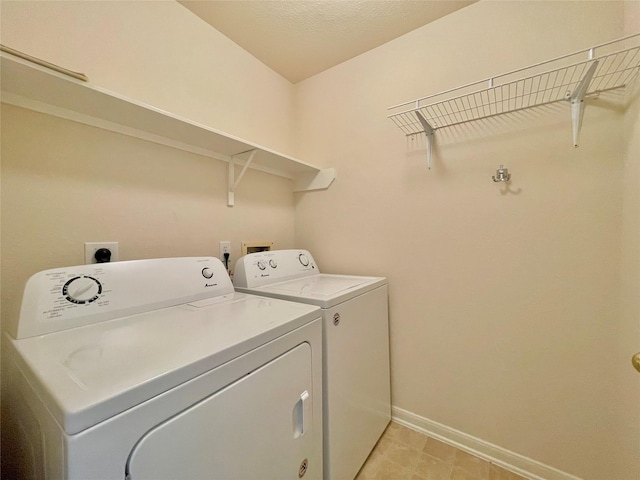 21807 Olympia Springs Ln, Katy, TX 77449 - washroom featuring washing machine and dryer and baseboards