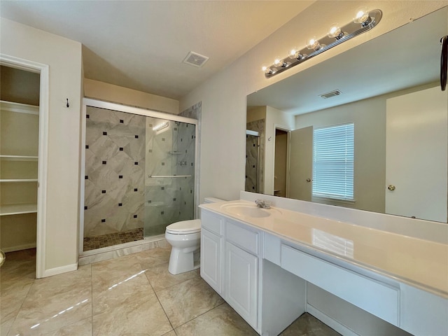 21807 Olympia Springs Ln, Katy, TX 77449 - bathroom with a shower stall, toilet, and vanity