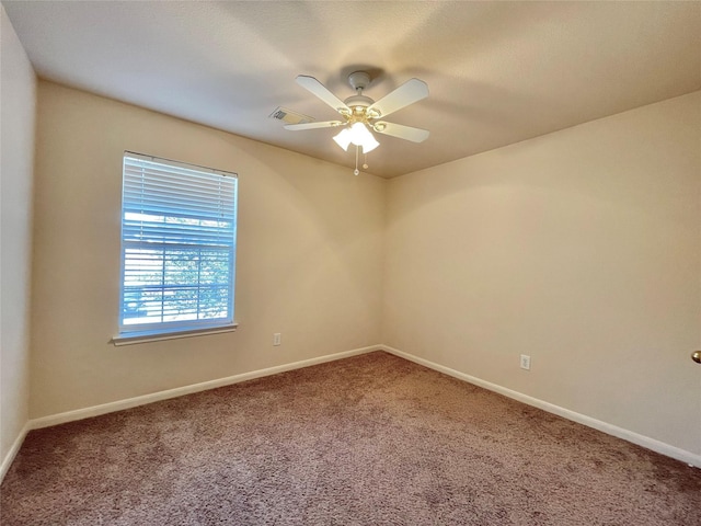 21807 Olympia Springs Ln, Katy, TX 77449 - spare room with carpet floors, a ceiling fan, and baseboards