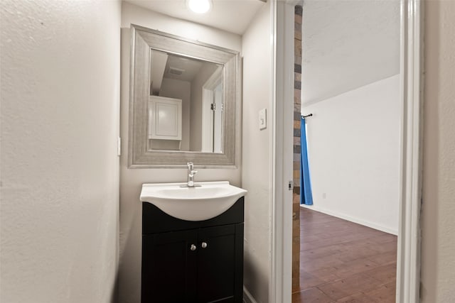 14721 Perthshire Rd, Houston, TX 77079 - bathroom featuring vanity and hardwood / wood-style floors