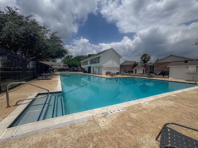 14721 Perthshire Rd, Houston, TX 77079 - community pool featuring a patio area