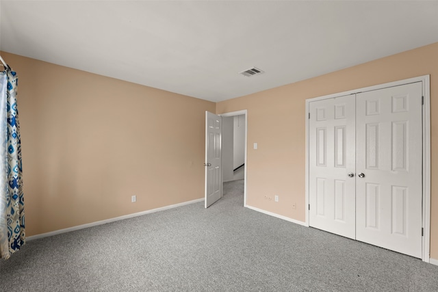 14721 Perthshire Rd, Houston, TX 77079 - unfurnished bedroom featuring carpet floors, baseboards, and a closet