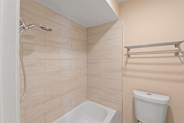 14721 Perthshire Rd, Houston, TX 77079 - bathroom featuring toilet and washtub / shower combination