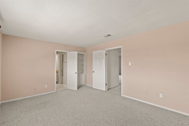 14721 Perthshire Rd, Houston, TX 77079 - unfurnished bedroom featuring light carpet and baseboards