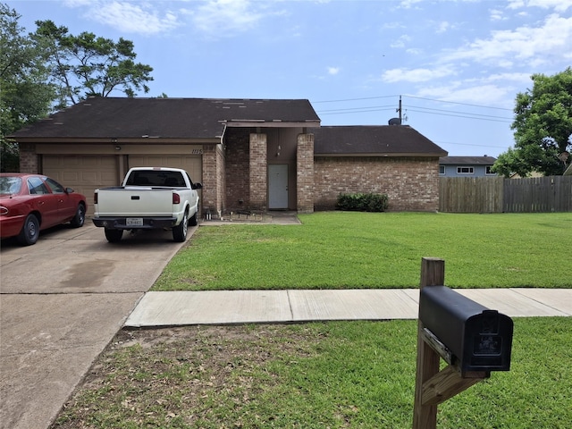 1115 Whispering Pine Dr, Missouri City, TX 77489 - view of front facade with brick siding, an attached garage, and concrete driveway