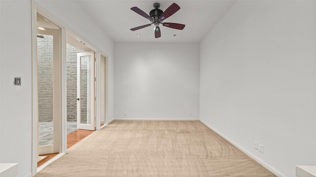 4868 Post Oak Timber Dr, Houston, TX 77056 - unfurnished bedroom with access to outside, carpet flooring, and a ceiling fan