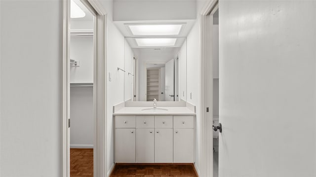 4868 Post Oak Timber Dr, Houston, TX 77056 - bathroom with vanity and a walk in closet