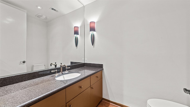 4868 Post Oak Timber Dr, Houston, TX 77056 - half bath with vanity and wood finished floors