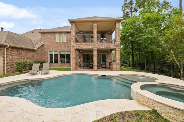 211 Twilight Toast Dr, Conroe, TX 77304 - view of swimming pool with an in-ground hot tub and a patio