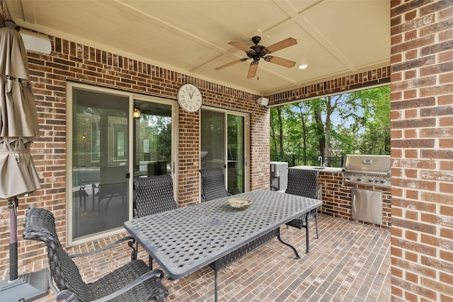 211 Twilight Toast Dr, Conroe, TX 77304 - view of patio / terrace with ceiling fan, outdoor dining space, and a sink