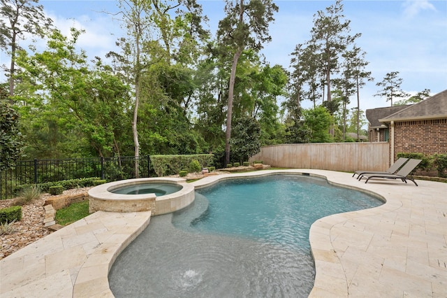 211 Twilight Toast Dr, Conroe, TX 77304 - view of swimming pool featuring a fenced backyard, a patio, and a pool with connected hot tub