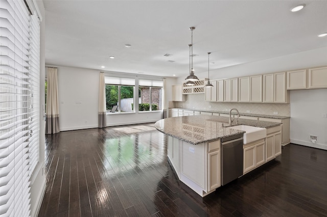 211 Twilight Toast Dr, Conroe, TX 77304 - kitchen with dishwasher, a sink, recessed lighting, light stone countertops, and a center island with sink