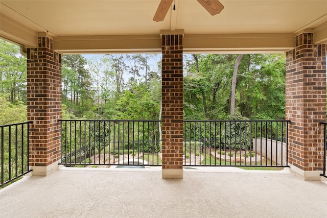 211 Twilight Toast Dr, Conroe, TX 77304 - view of patio / terrace featuring ceiling fan and view of scattered trees