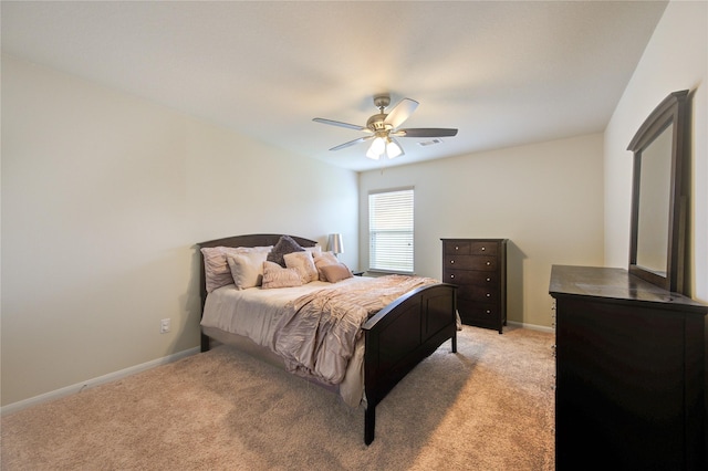 4247 Duneberry Trl, Humble, TX 77346 - bedroom with light carpet, baseboards, and ceiling fan