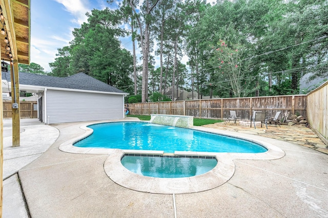 17706 August Meadows Ln, Spring, TX 77379 - view of swimming pool with a patio, a fenced backyard, and a pool with connected hot tub